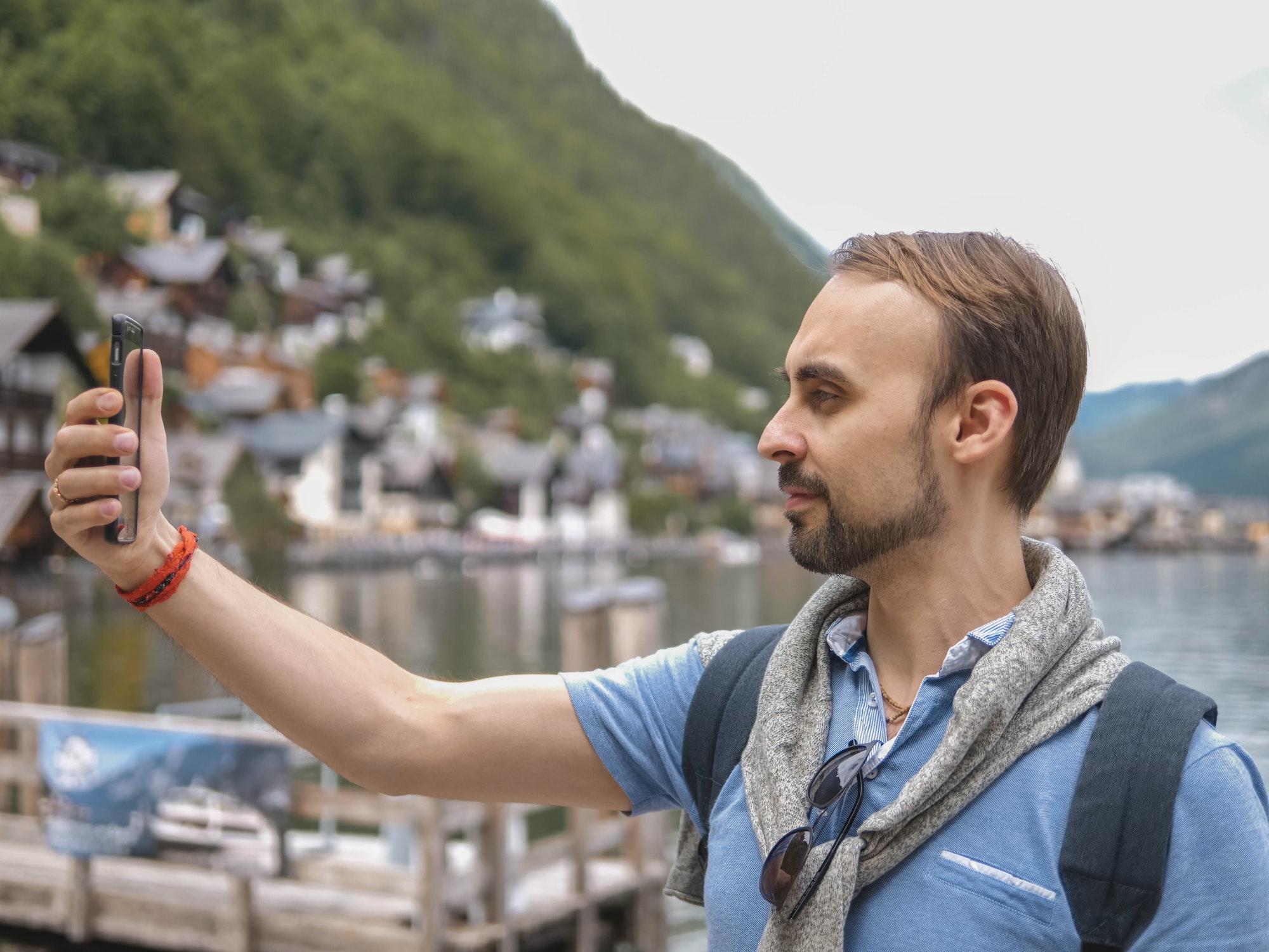 Diverse People Face man taking a picture selfie phone